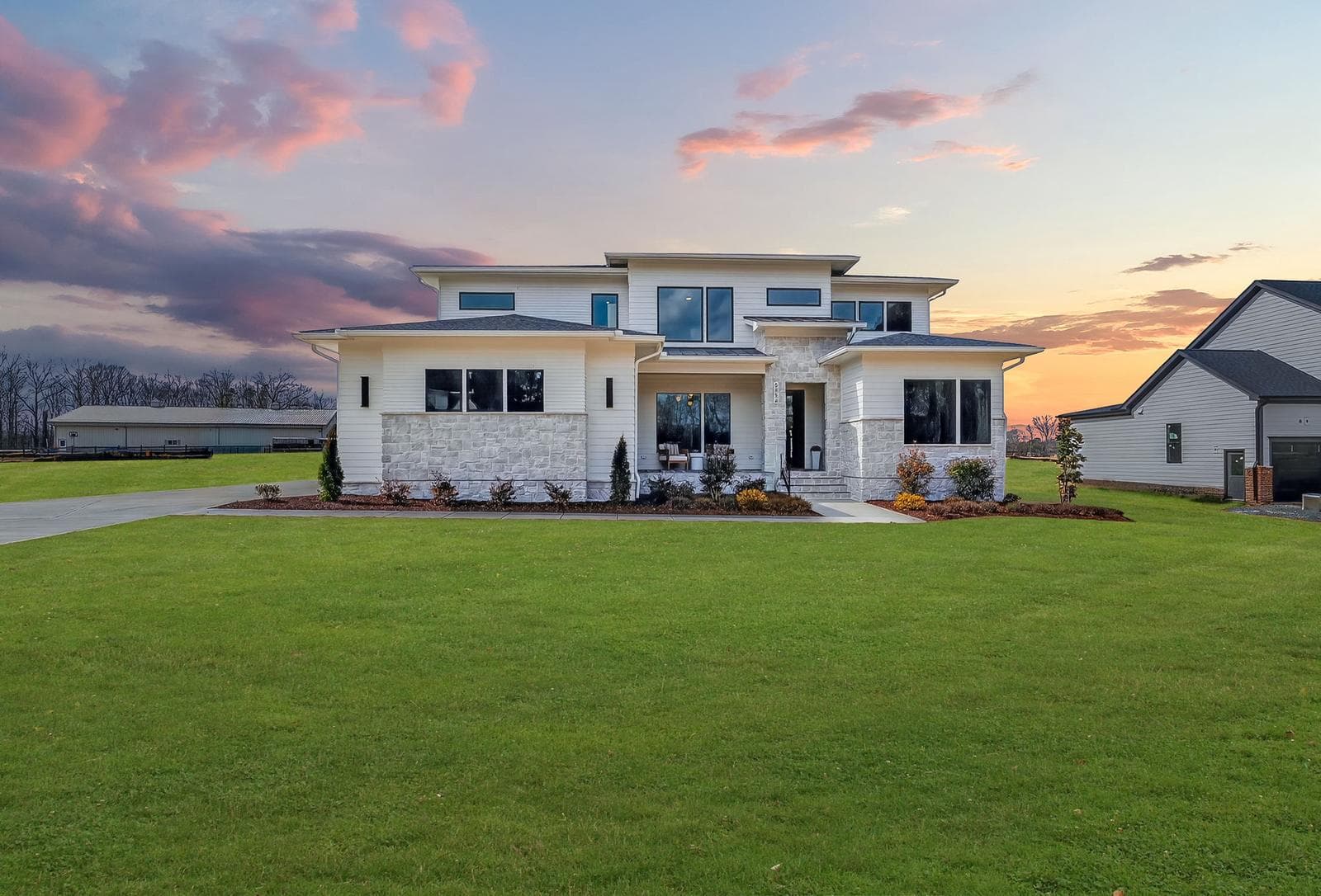 Front exterior of a modern luxury listing